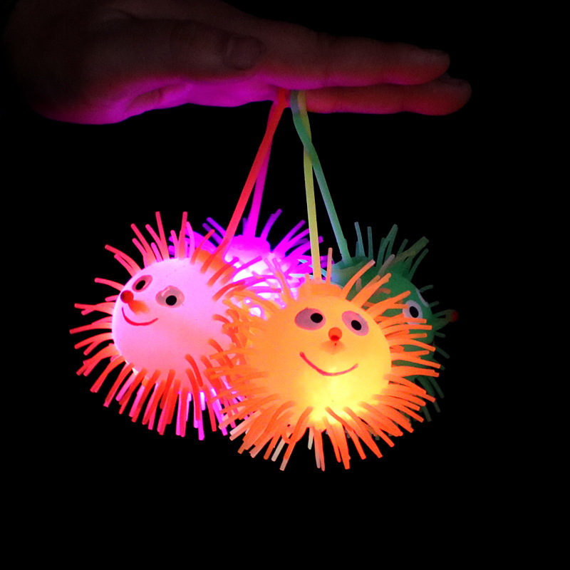 Hot selling Squeeze Stress Toys Tpr Hedgehog Puffer Led Toys Colorful Glowing Smile Nose Puffer Balls for Kids