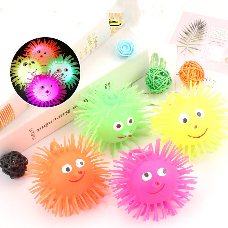 Hot selling Squeeze Stress Toys Tpr Hedgehog Puffer Led Toys Colorful Glowing Smile Nose Puffer Balls for Kids