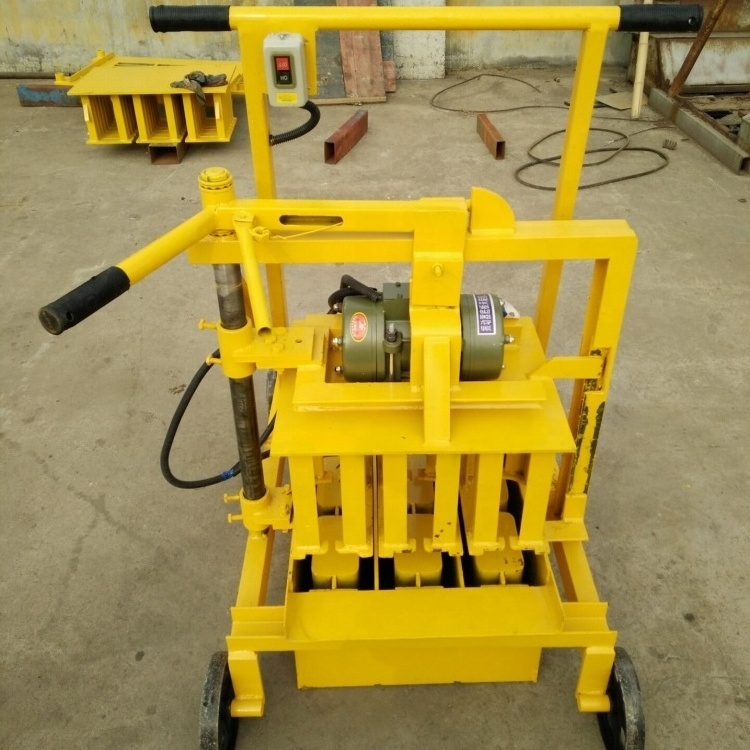 small mobile cement block machine uk price QMR2-45 simple egg layer manual concrete brick hollow block making machine