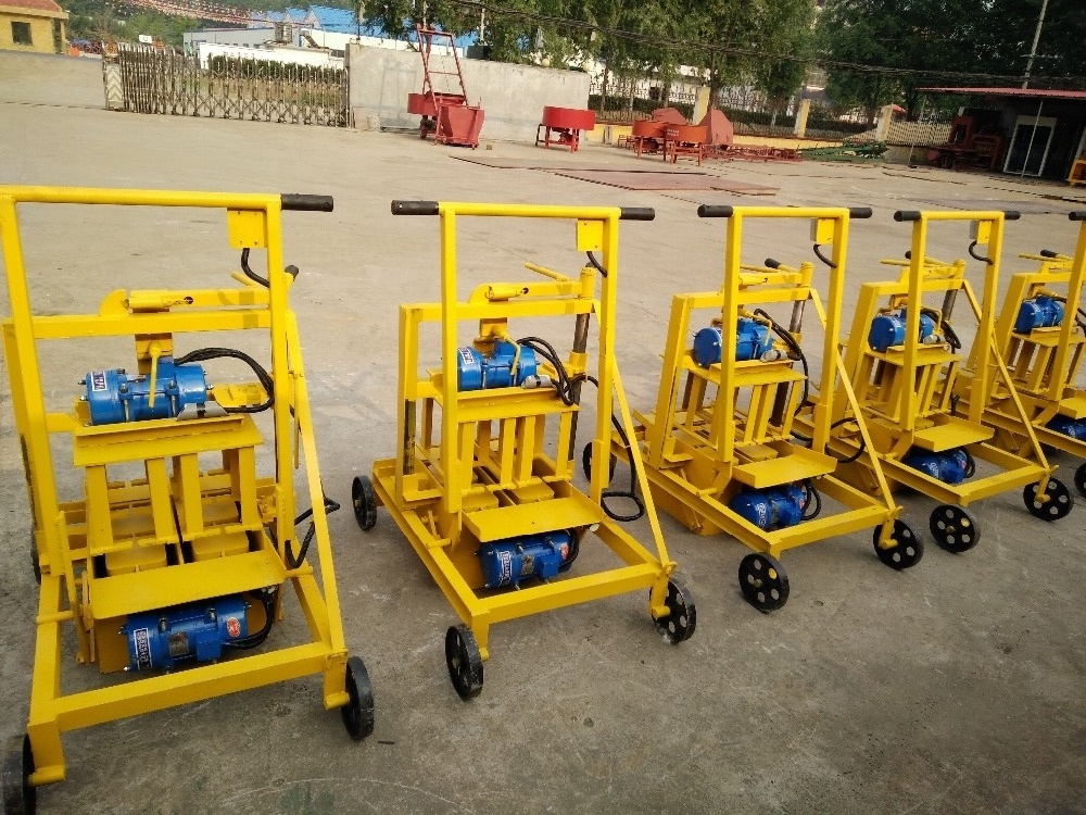 small mobile cement block machine uk price QMR2-45 simple egg layer manual concrete brick hollow block making machine