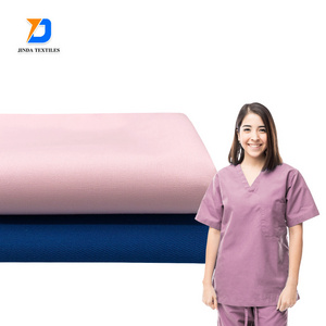 Jinda custom poly stock lot 30% polyester 70% cotton  60 cotton 40 polyester Plain Dyed medical   fabric