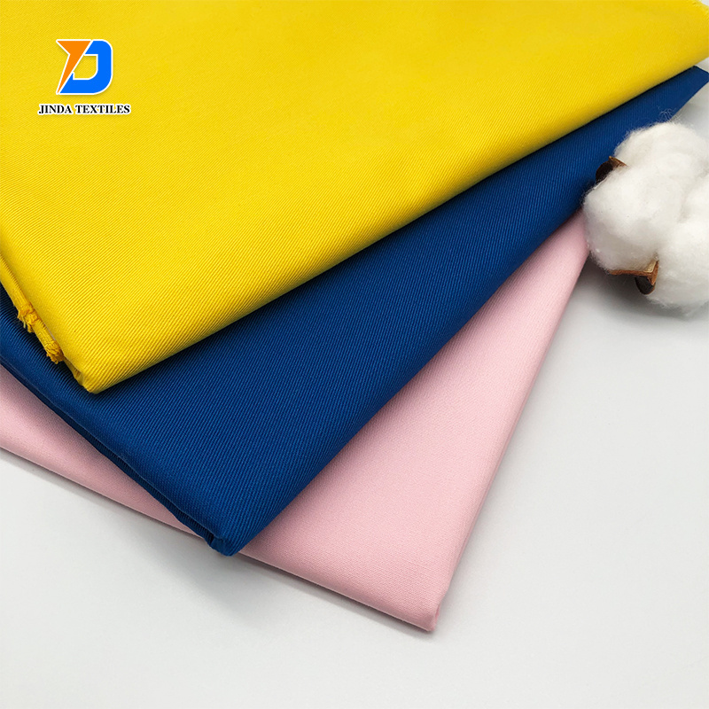 Jinda custom poly stock lot 30% polyester 70% cotton  60 cotton 40 polyester Plain Dyed medical   fabric