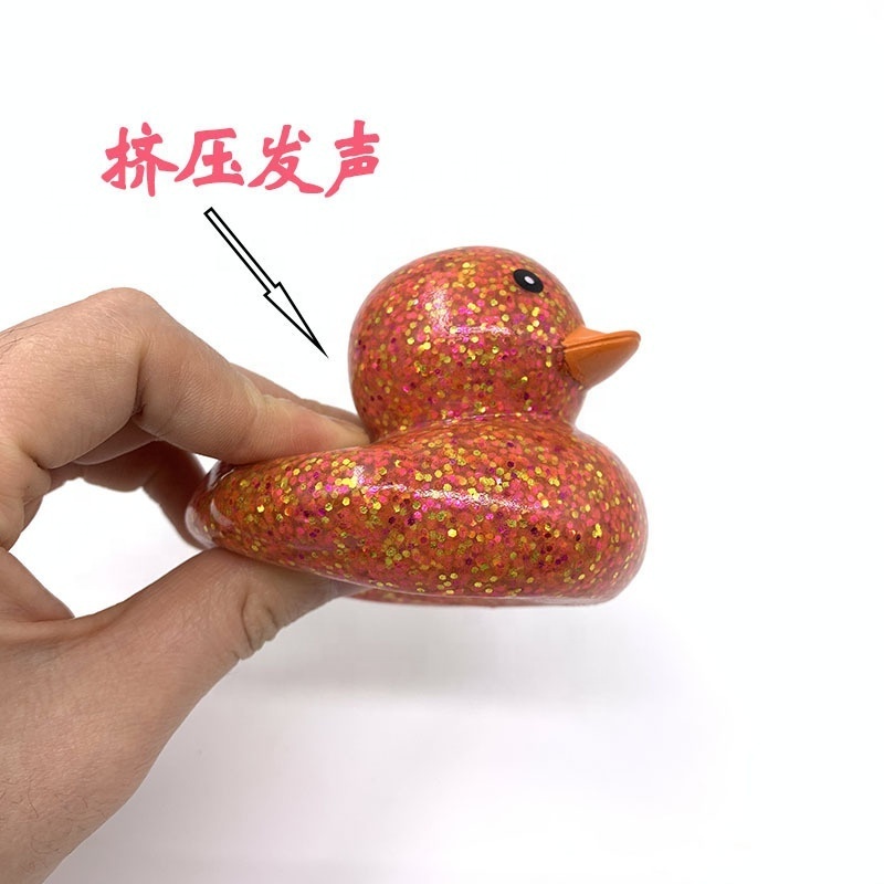 Yiwu JO Hot Sale Glitter Ducks For Baby Bath Children Kids Swimming Water Game Mini Soft Rubber Floating Small Toy Wholesale 2022