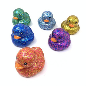 Yiwu JO Hot Sale Glitter Ducks For Baby Bath Children Kids Swimming Water Game Mini Soft Rubber Floating Small Toy Wholesale 2022