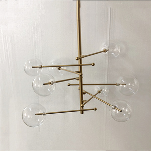 Customized Modern Warm White Glass Globe Mobile Linear Chandelier Brass Lighting for Home and Living Room