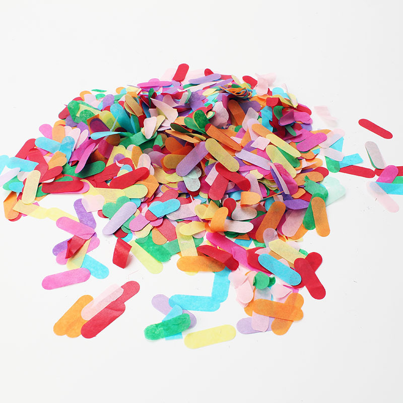 Ice cream colored strips of confetti throwing confetti Bobo ball balloons filled with sequin paper