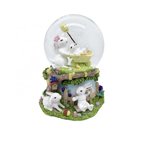 new arrival custom wholesale home decor musical  water snow globe crystal snow globe for easter