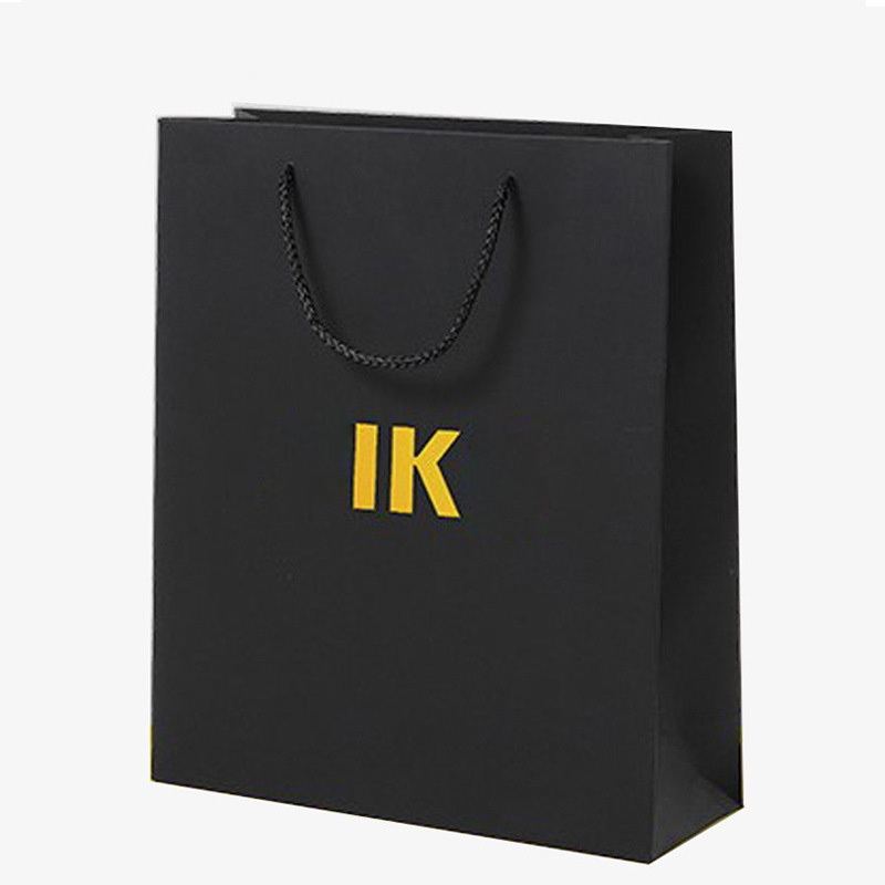 Chinese  suppliers wholesales black handle paper material fashion lady shopping horizontal black clothing tote bags for presents