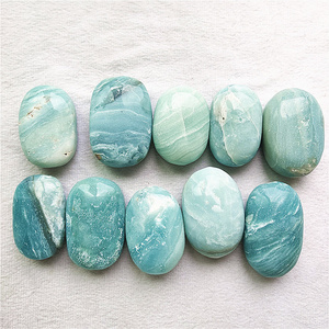 Wholesale Natural high quality sky blue crystal palm stone caribbean calcite palm for sale