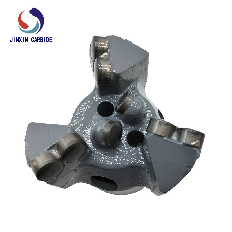 Three-wing reinforced concave coreless drill bit for mining