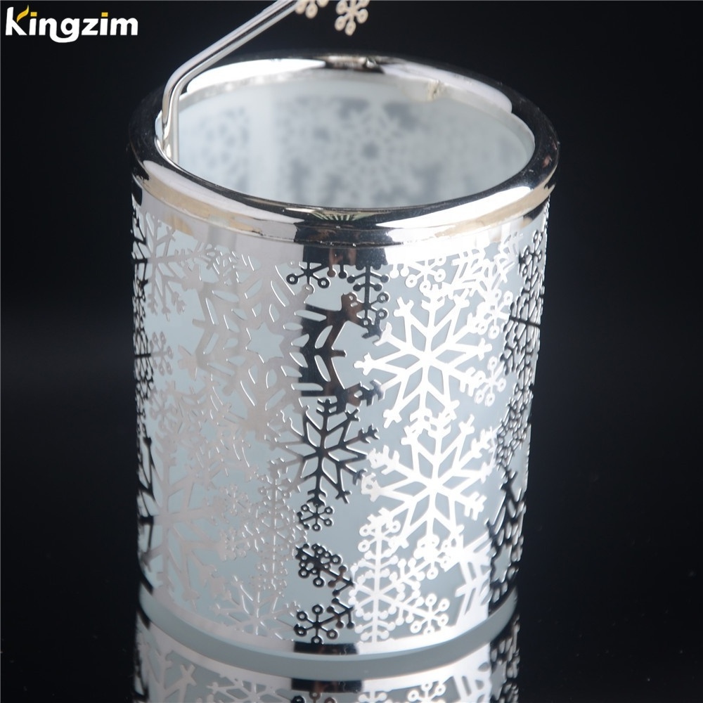 China Factory wholesale Snowflake Rotary spinning candle holder Metal Tealight Votive candle holder For Christmas tree gifts