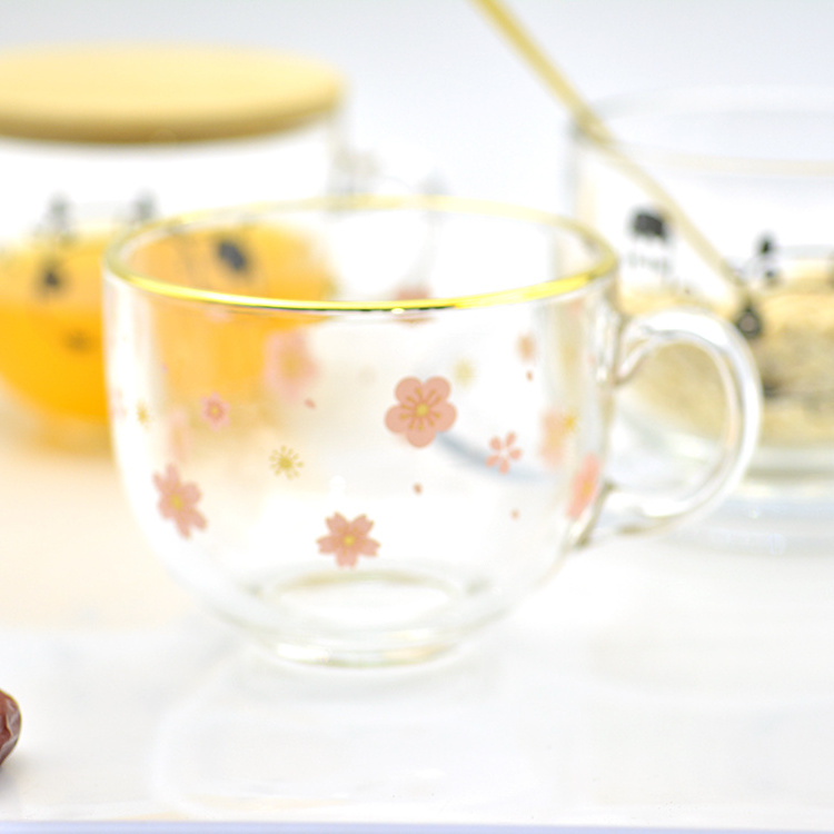 Colored glass cup sakura decals with gold outline rim and bamboo lid and cherry blossom spoon for Coffee oat milk mugs