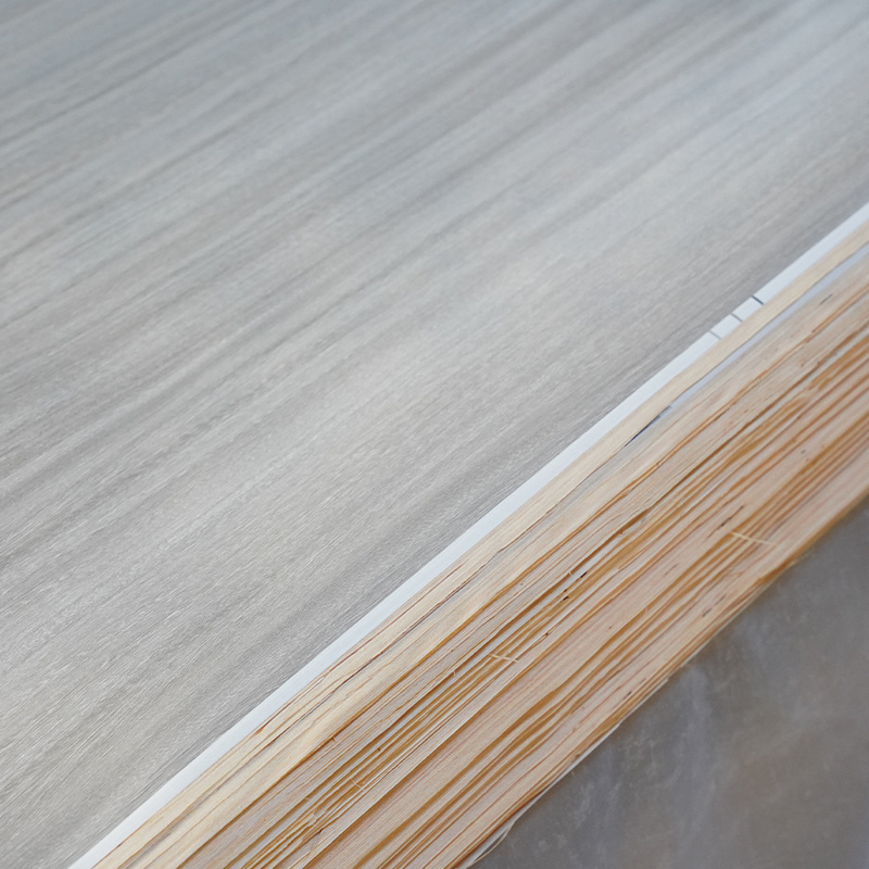 Decorative synchronous laminated melamine faced recon engineered veneer