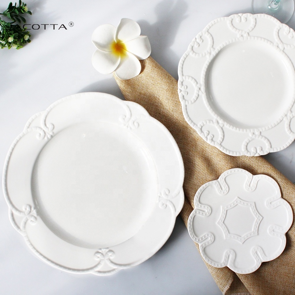 Eco-friendly bulk white serving dishes spanish porcelain dinnerware sets ceramic embossed serving plate