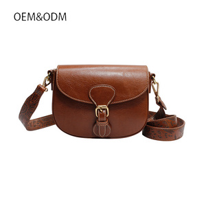 2024 new trend famous Half Moon Shape Brown PU Leather Cover Bag Flap Cross body Handbags for ladies