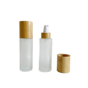 50ml frosted glass bottle with bamboo treatment pump and bamboo cap hair oil bottles glass potion bottle