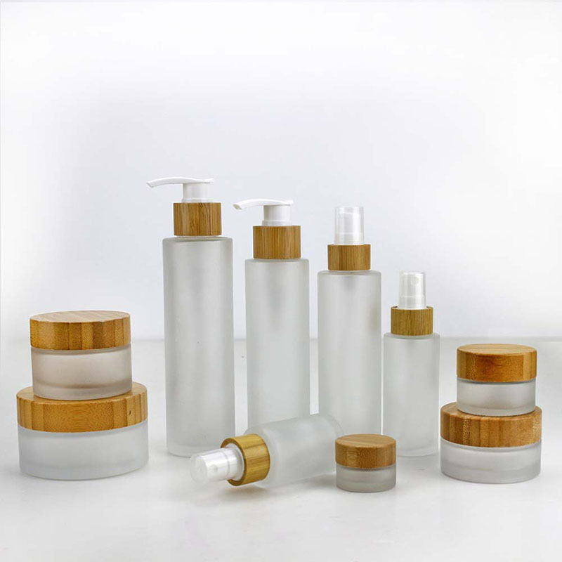 50ml frosted glass bottle with bamboo treatment pump and bamboo cap hair oil bottles glass potion bottle