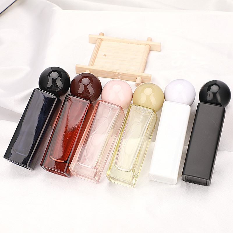 Low moq special 1oz 30ml square black white pink perfume glass packaging good mist spray bottles