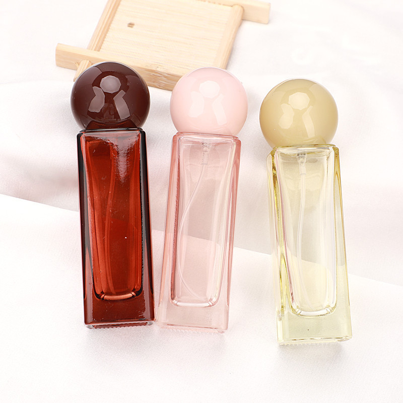 Low moq special 1oz 30ml square black white pink perfume glass packaging good mist spray bottles