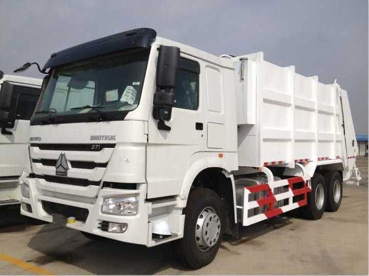 howo 4*2 small rear loader compressed garbage truck