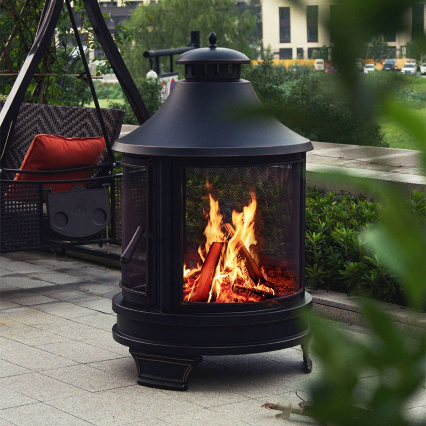 Enhance your patio with a wood-burning fire bowl, a modern addition to your outdoor decor