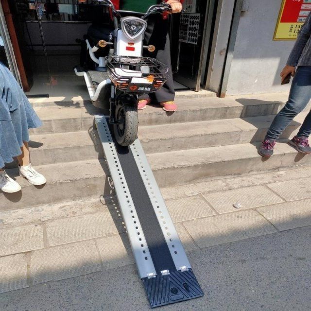 Wheelchair stairs portable barrier-free ramp board motorcycle wheelchair electric car on the car upstairs step board slope