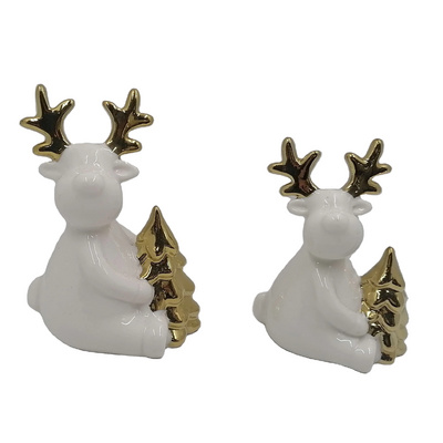 White Ceramic reindeer figurine with Gold Christmas Tree