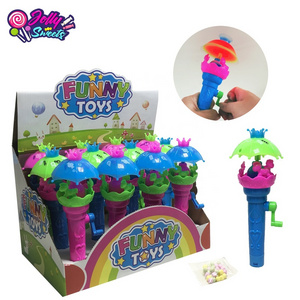 Wholesale hand driven lighting umbrella candy toy plastic toy with candy