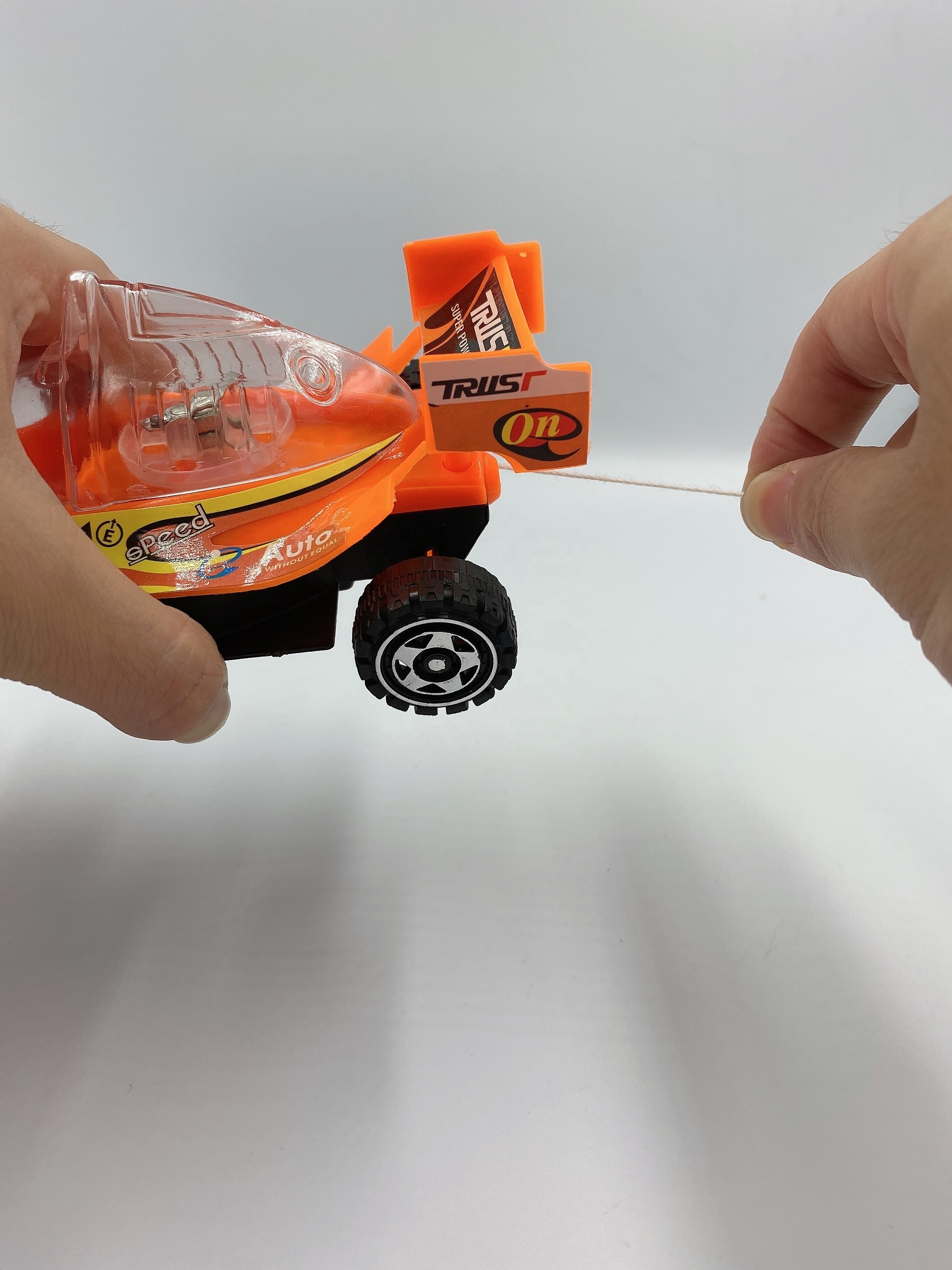 Promotional Cheap Toys Kids Mini Car Toy Pull String Light Up Plastic Racing Cars Model Candy Toy For Children