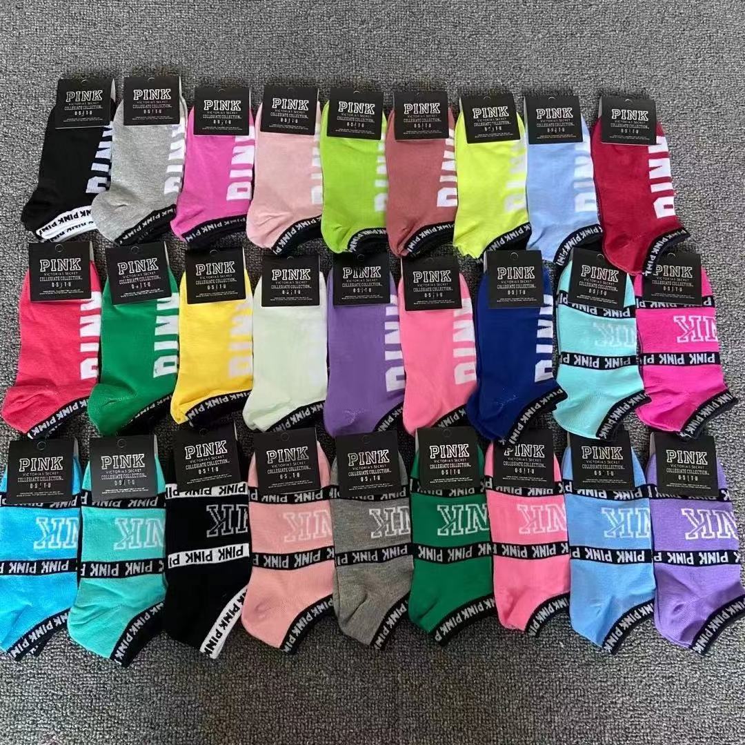 Fashion girls pink soccer athletic grip socks designer custom logo cotton long socks wholesale