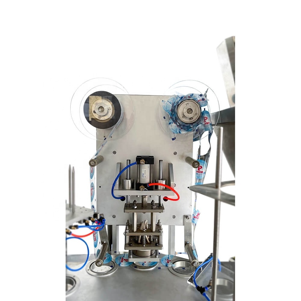 rotary type automatic plastic cup filling and sealing machine for granule salt with four-head scale and pressing lid function