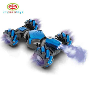 Joyteam toys  Off Road Vehicle Dual Remote Control Car Spray Hand Gesture Control Twist Car with light music