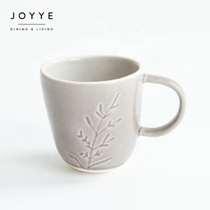 JOYYE wholesale high quality ceramic coffee tea mug custom logo stoneware crackle debossed wild flower design cup mug