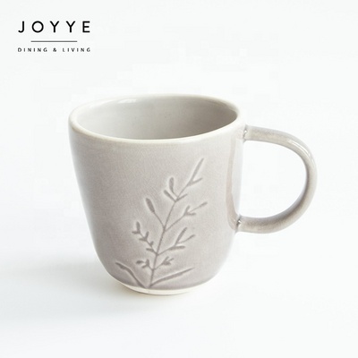 JOYYE wholesale high quality ceramic coffee tea mug custom logo stoneware crackle debossed wild flower design cup mug