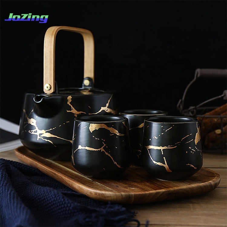 Amazon's Active Demand Black and White  Marble Tea Service Set Ceramic Large Tea Pot with Wooden Tray and 4 Pieces Tea Cups