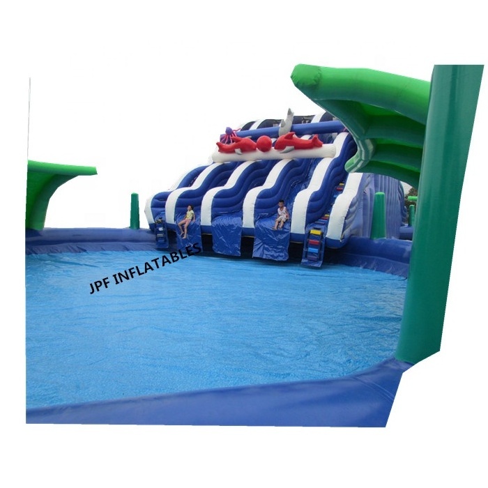 Tobogan inflable de palmeras con piscina para la diversion del verano