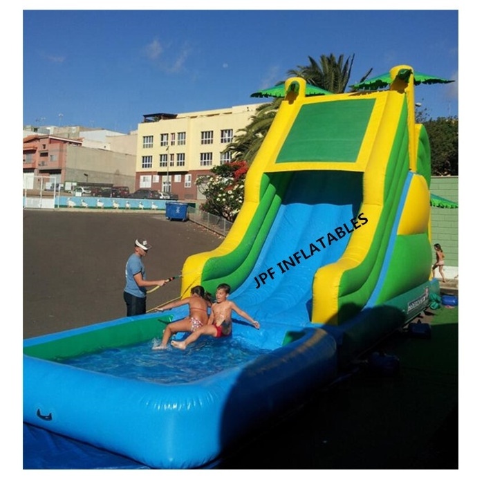 Tobogan inflable de palmeras con piscina para la diversion del verano