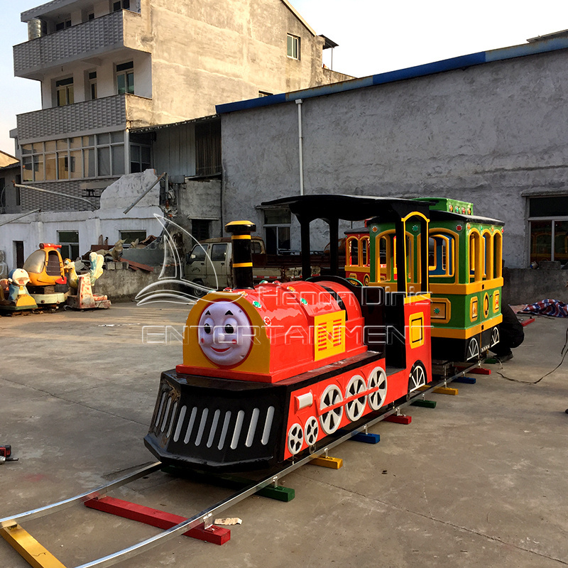 Amusement theme park children ride on little steam train and track for sale