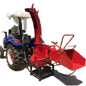 The tractor drives the garden city road branch twig shredder sawdust sawdust wood shredder 15hp wood chipper