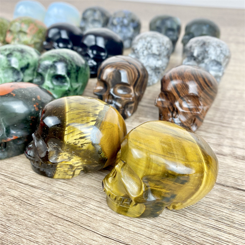 Newest Natural Crystal Hand Carved Crafts Mini Size Mixed Material Skulls Healing Stones Crystal Tiger Eye Skulls for Decoration