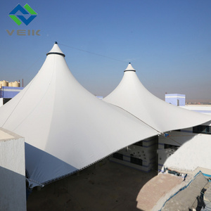 Tensioned fabric shade tensile umbrella membrane structure