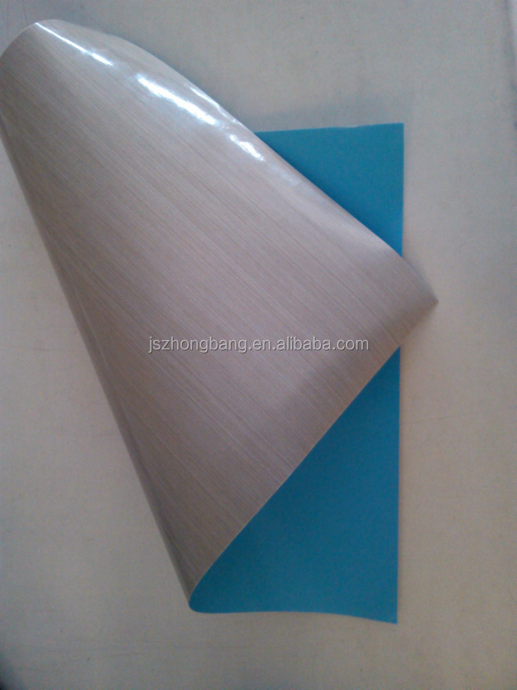 Woven fiberglass fabric coated with PTFE