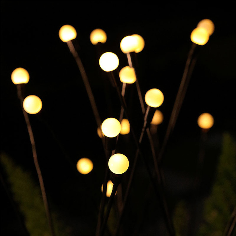 Outdoor little bulbs on wires in the grass and swing around garden solar portable light firefly solar garden light