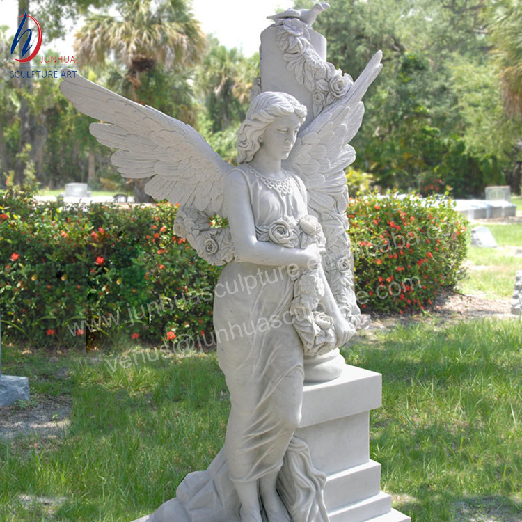 White Marble Cross Tombstone With Flowers Cemetery