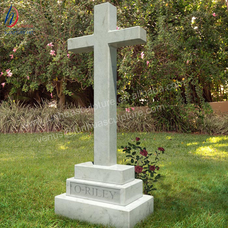 White Marble Cross Tombstone With Flowers Cemetery