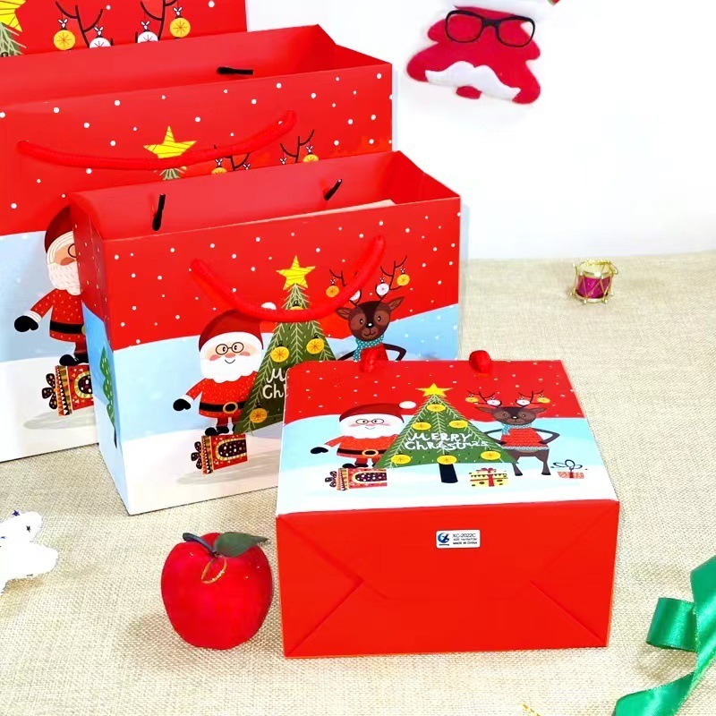 wholesale Merry Christmas paper gift bag folding Santa Claus tree cartoon red Christmas gift bags with handles