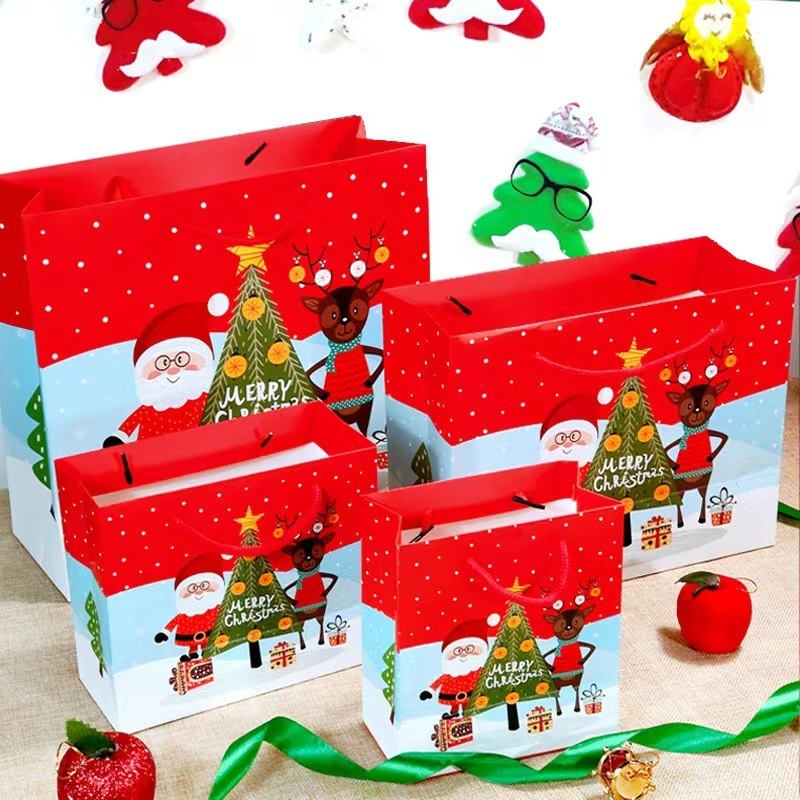 wholesale Merry Christmas paper gift bag folding Santa Claus tree cartoon red Christmas gift bags with handles