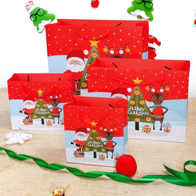 wholesale Merry Christmas paper gift bag folding Santa Claus tree cartoon red Christmas gift bags with handles