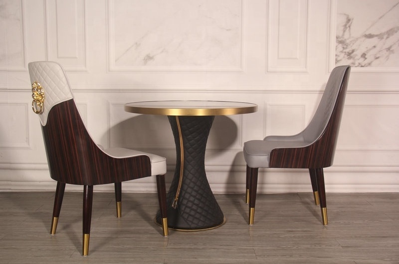 PU leather ebony back with lion head decoration,solid ash wood ss legs dining chairs in leather with gold legs