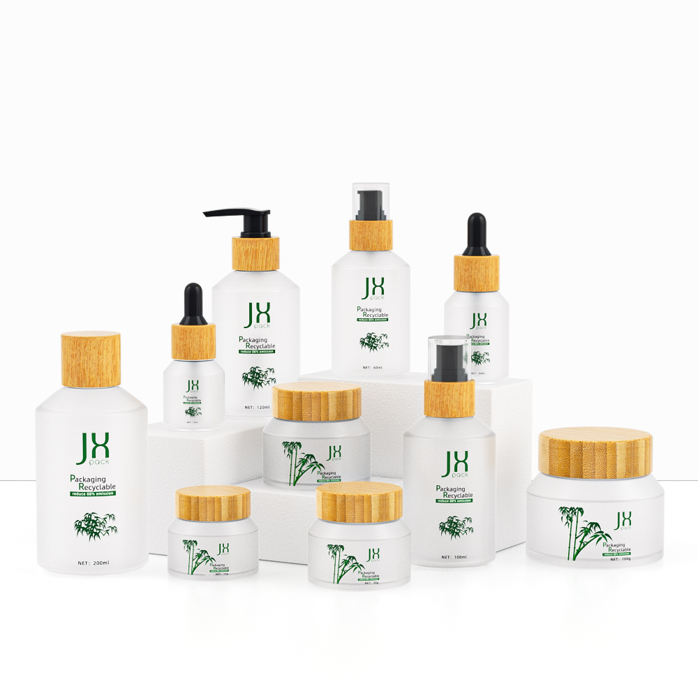 Wholesale eco friendly wooden bamboo cap cosmetic packaging amber empty cosmetic glass lotion pump bottle and cream jar